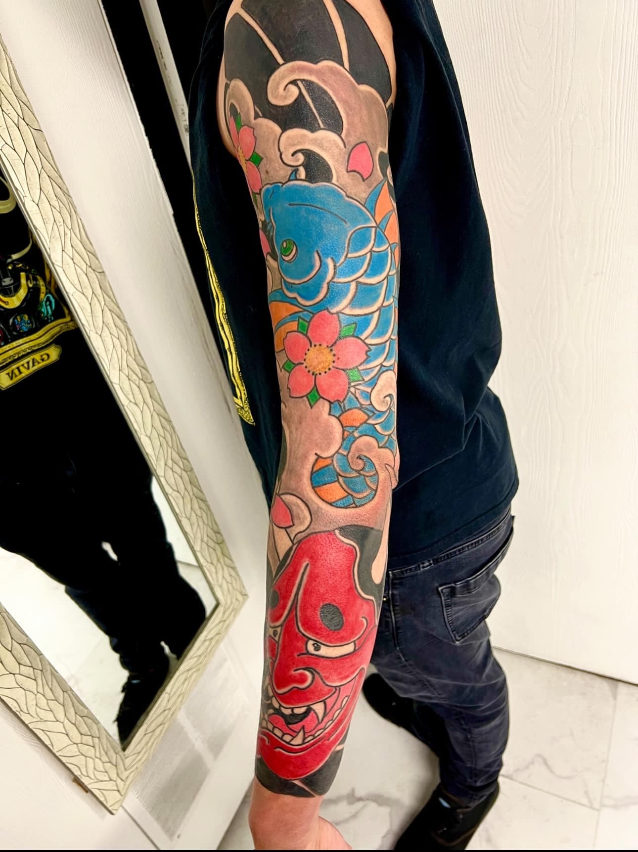 Traditional Japanese koi and hannya sleeve by Carlos Barrera