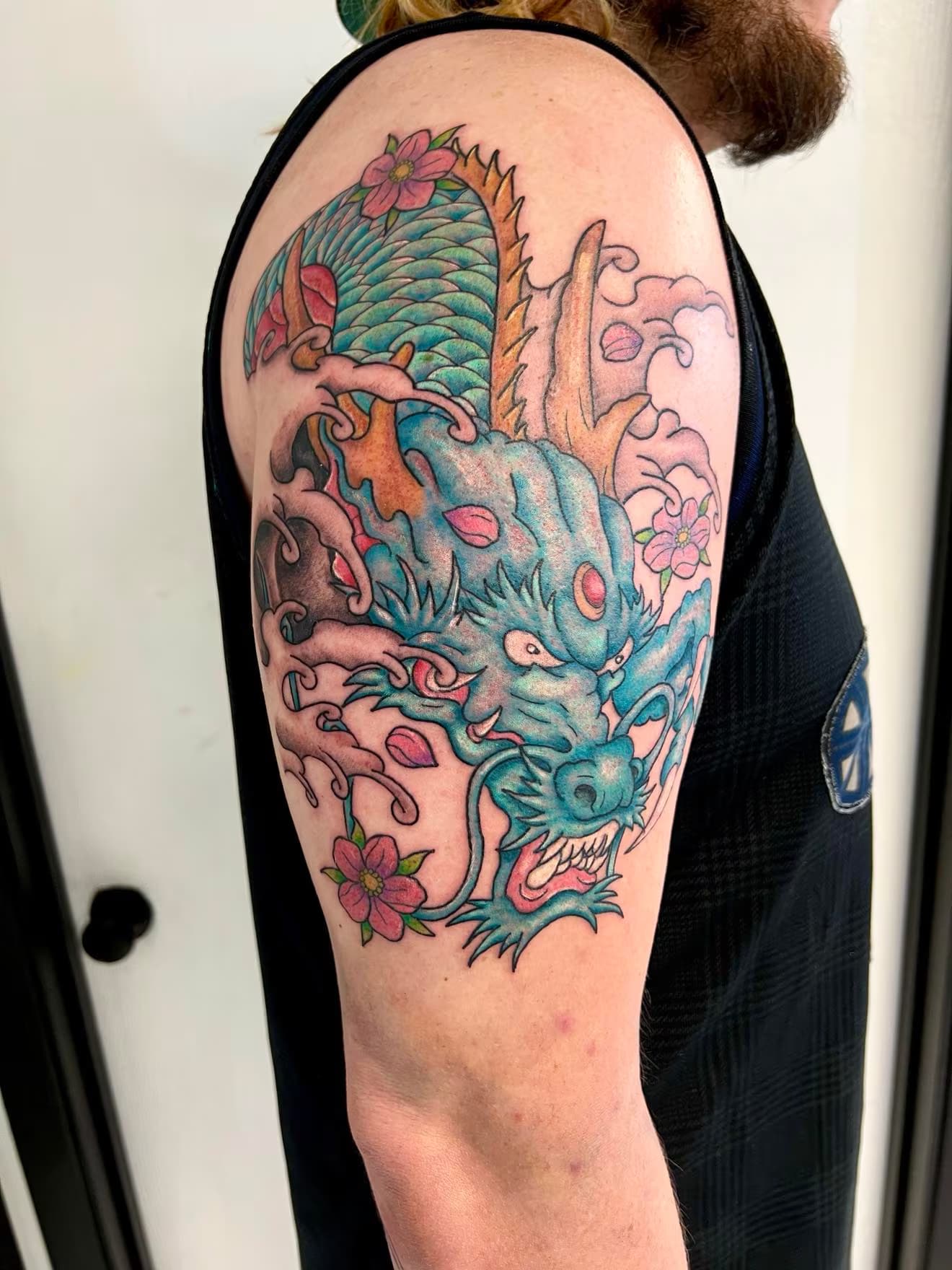 Neo-Japanese dragon and cherry blossom tattoo